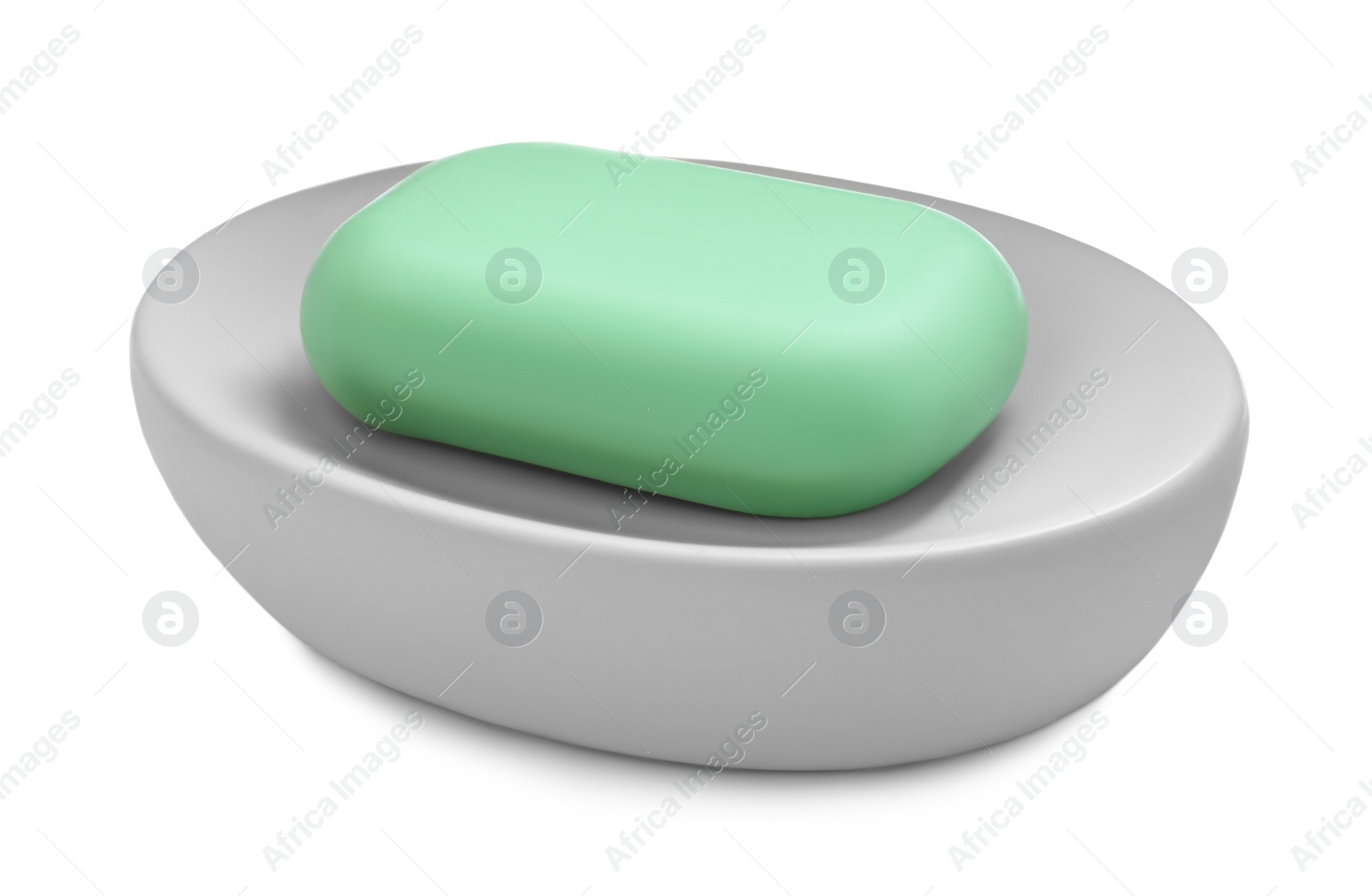 Photo of Holder with soap bar on white background