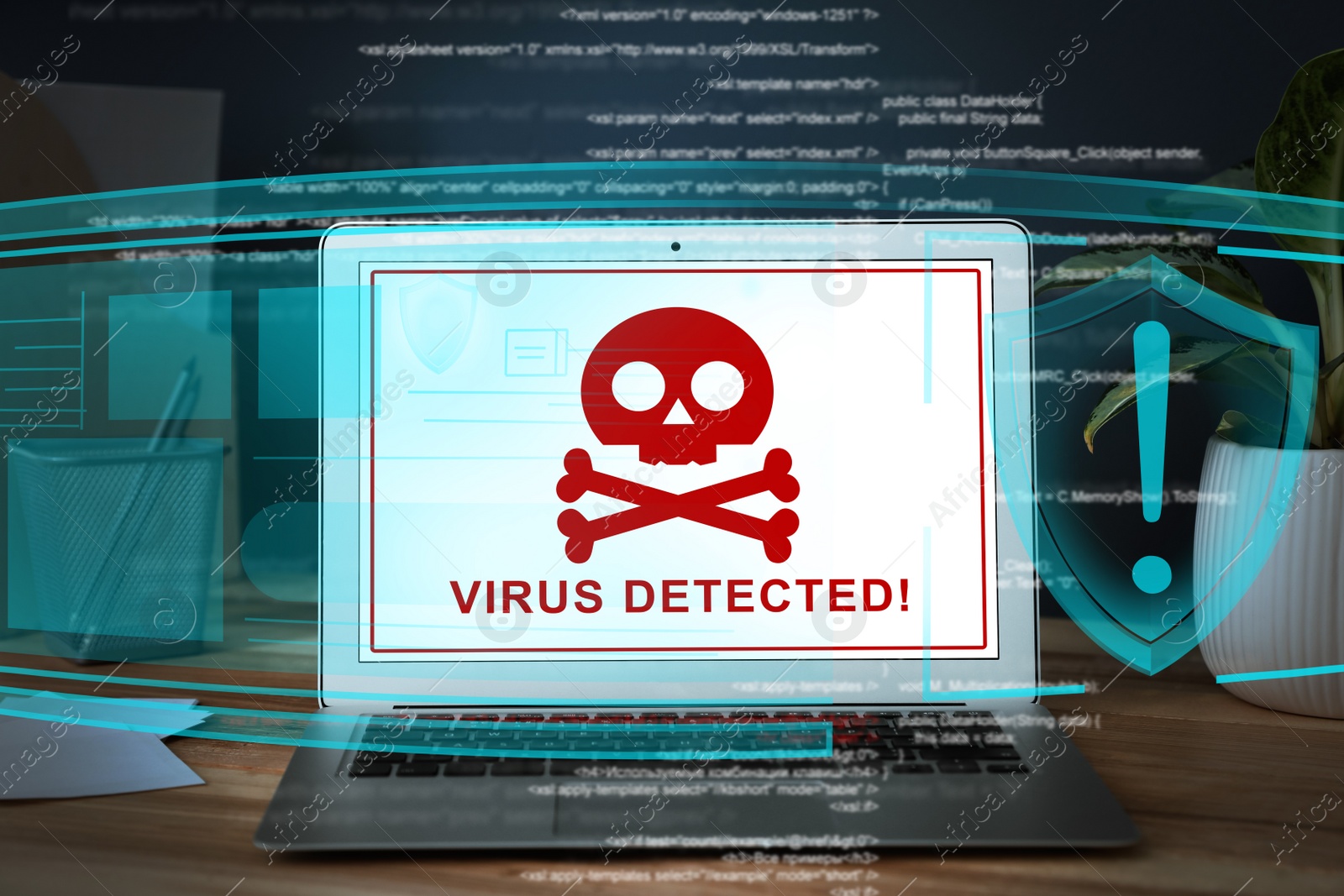 Image of Warning about virus attack on laptop screen. Workplace in office