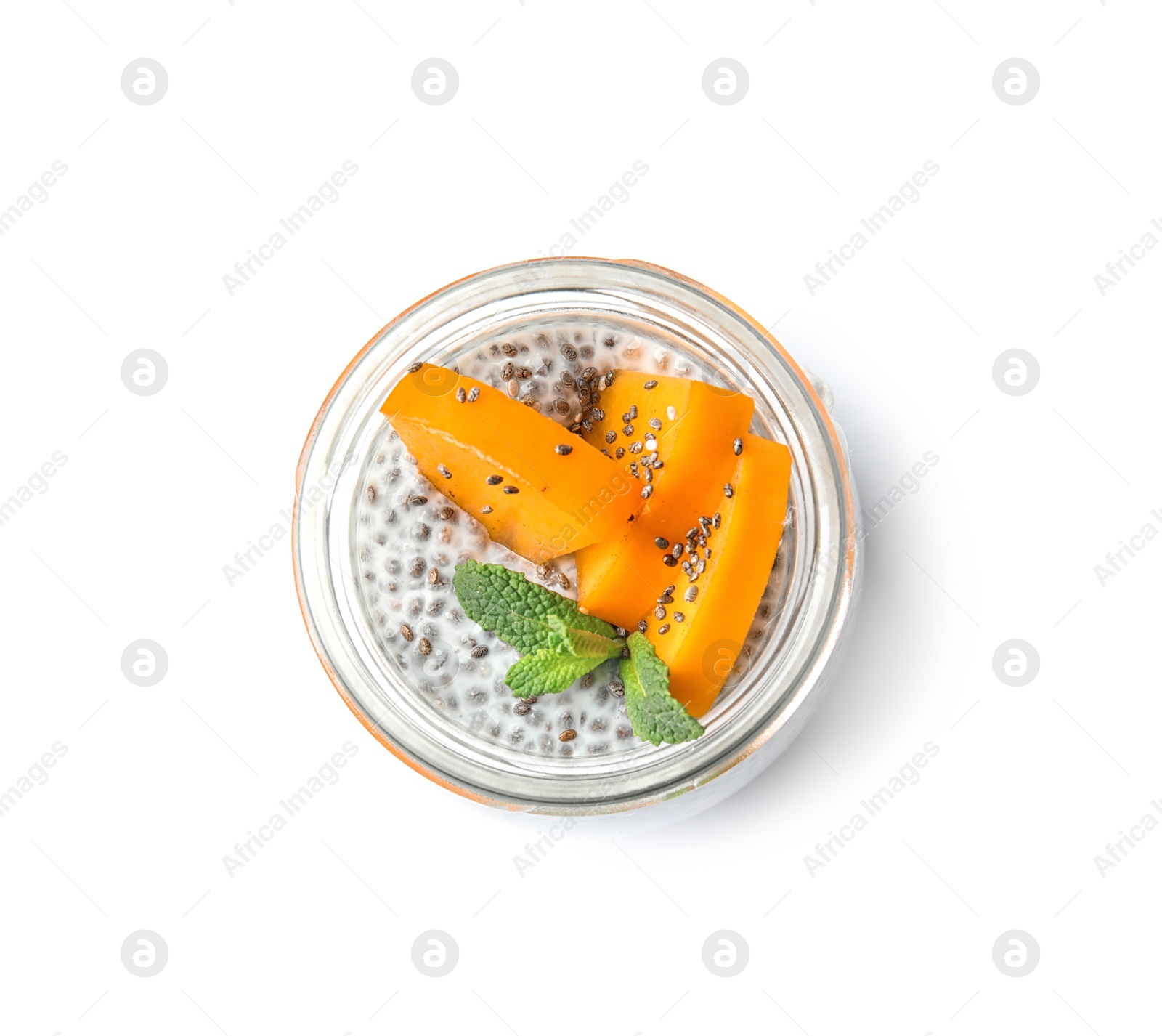 Photo of Glass jar of tasty chia seed pudding with persimmon isolated on white, top view