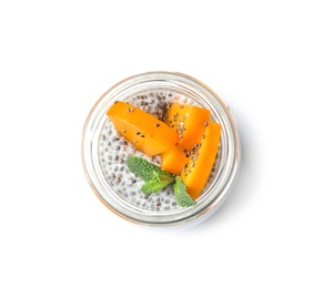 Photo of Glass jar of tasty chia seed pudding with persimmon isolated on white, top view