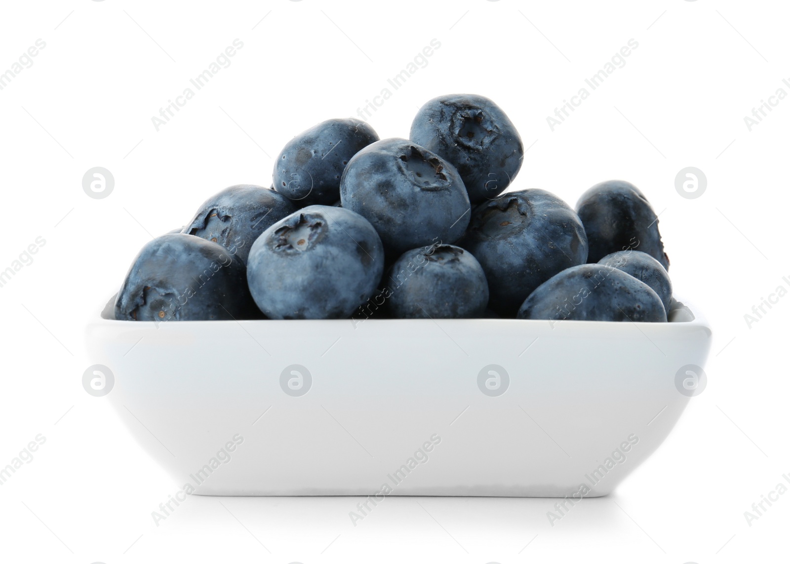 Photo of Bowl full of fresh ripe blueberries on white background