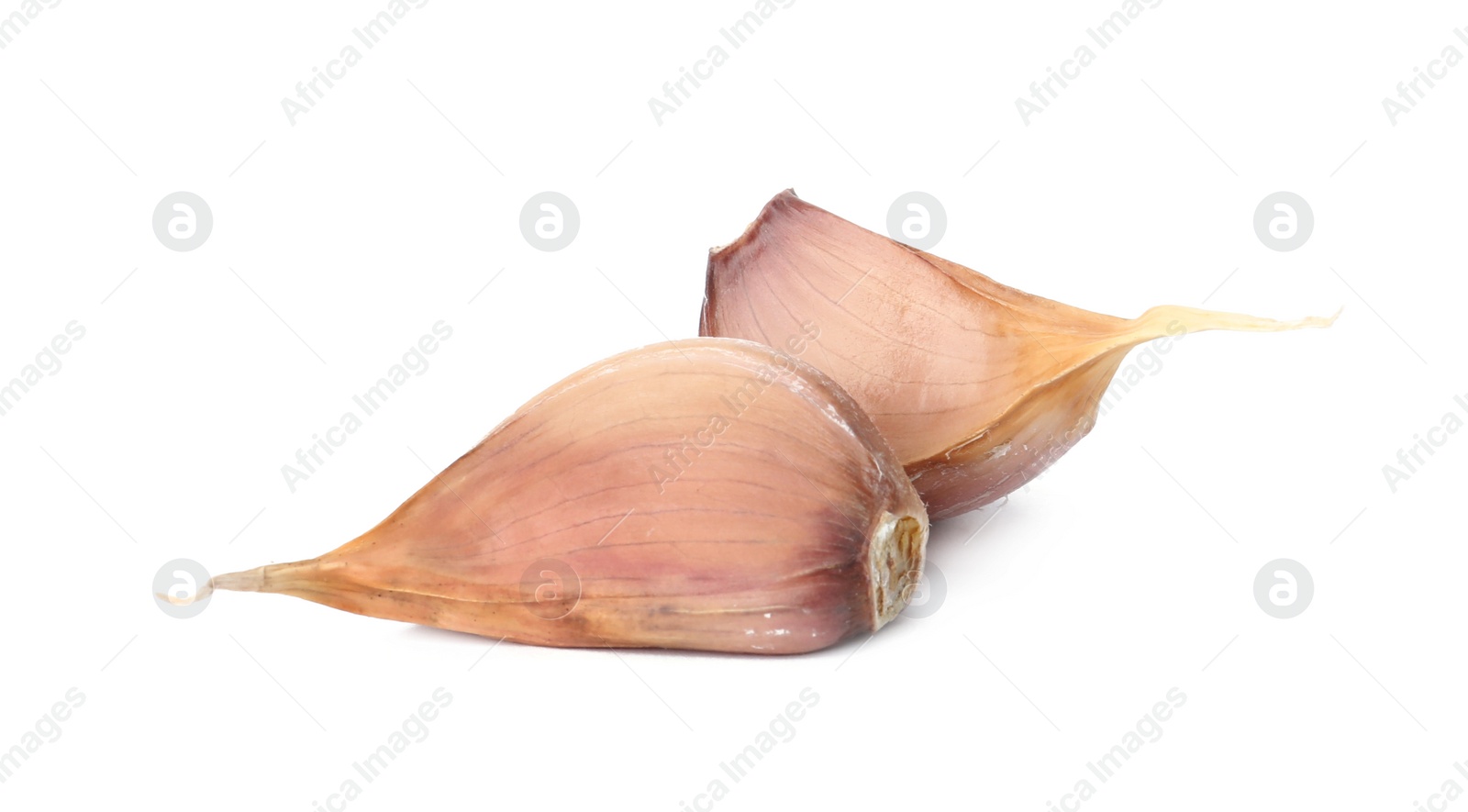 Photo of Fresh organic garlic cloves on white background