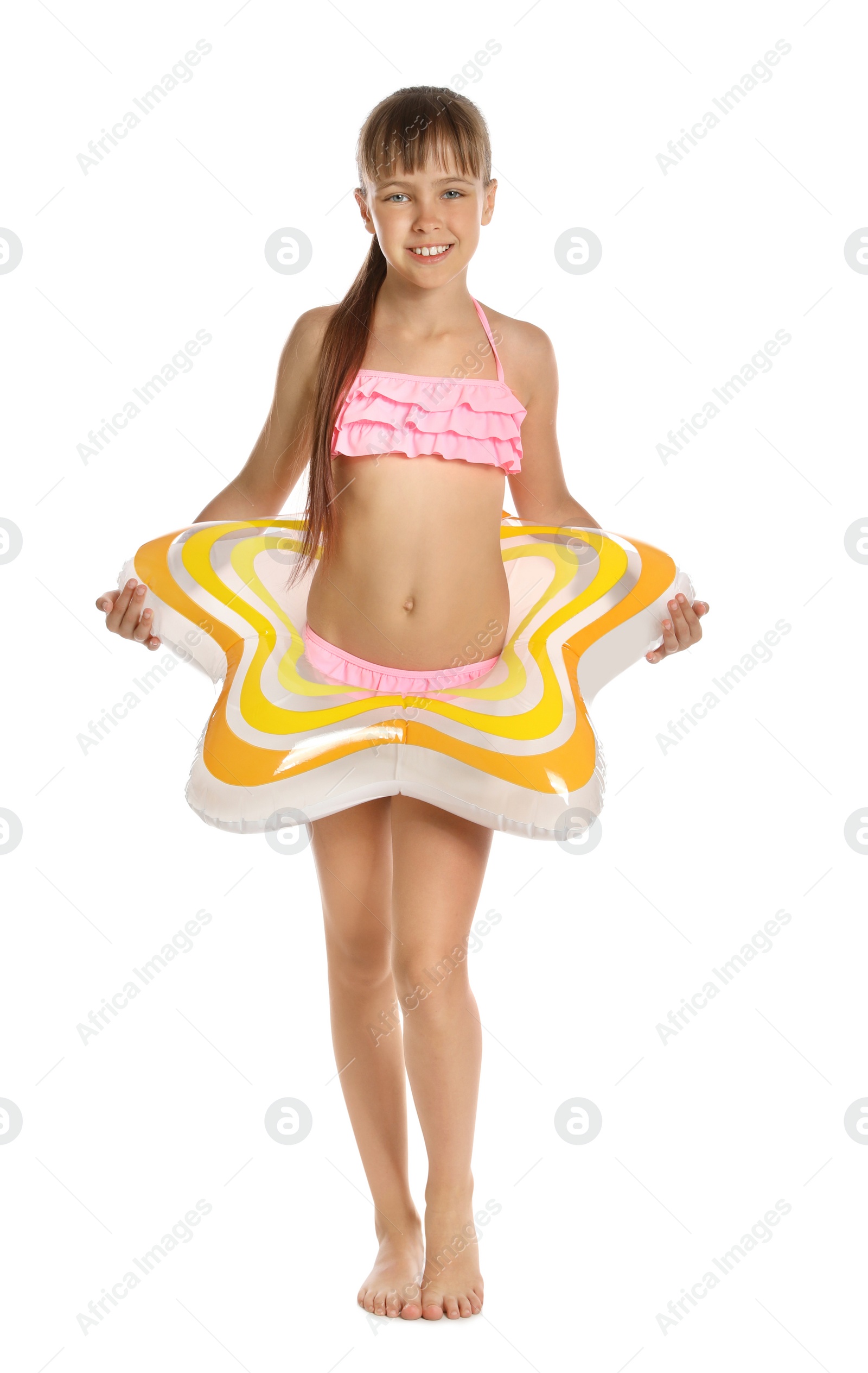 Photo of Cute little girl with bright inflatable ring on white background