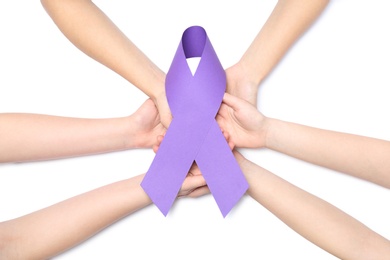 Photo of People holding purple awareness ribbon on white background, top view