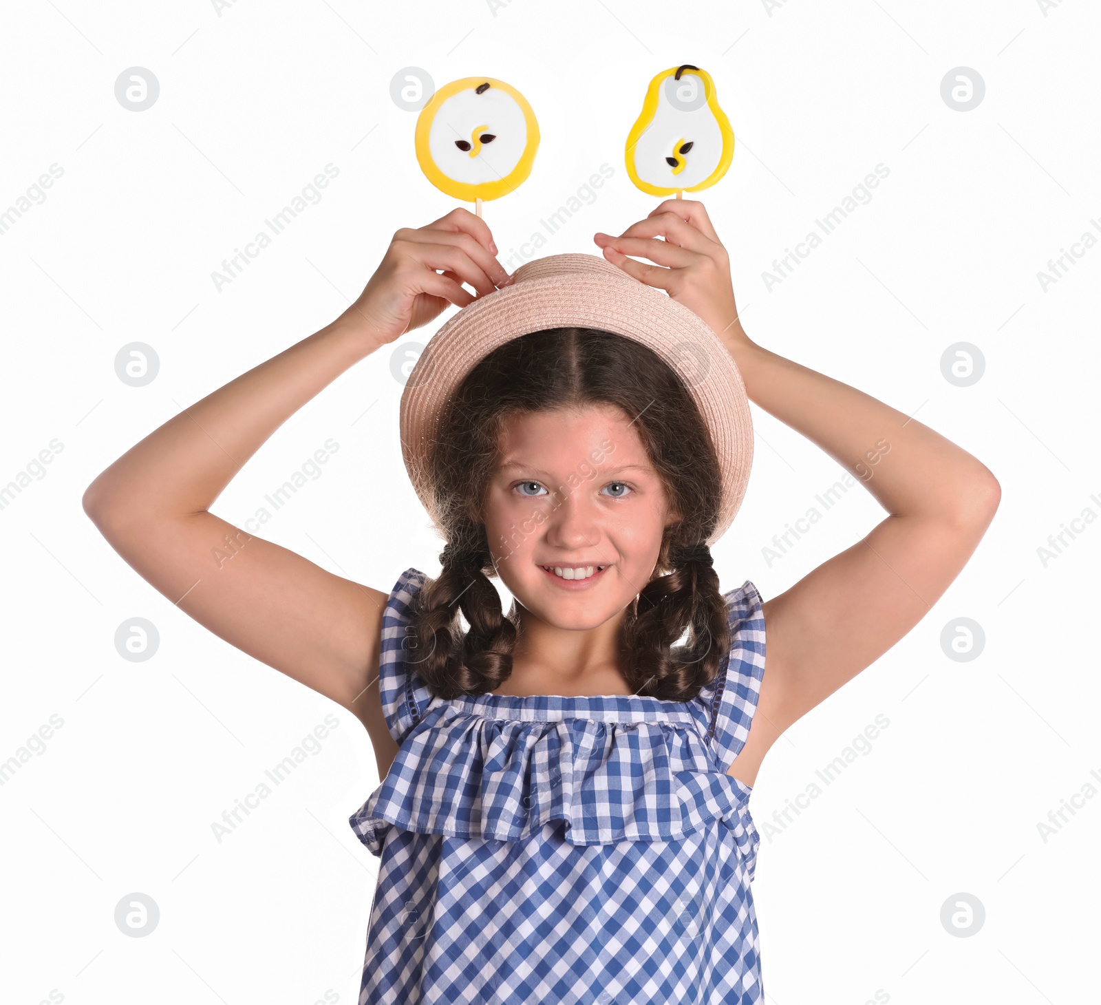 Photo of Little girl with candies on white background