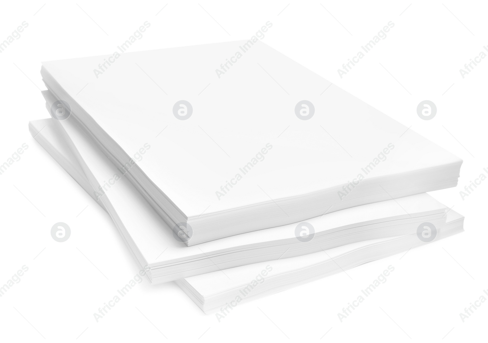 Photo of Stacks of paper sheets on white background