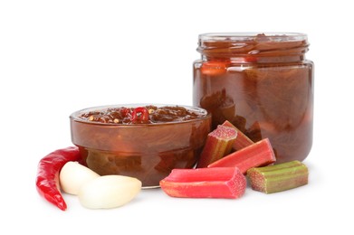 Photo of Tasty rhubarb sauce and ingredients isolated on white