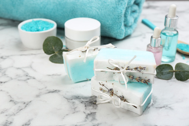 Photo of Natural handmade soap bars on marble table