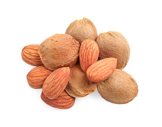 Photo of Organic dried apricot kernels on white background, top view