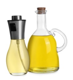 Photo of Bottles of cooking oil on white background