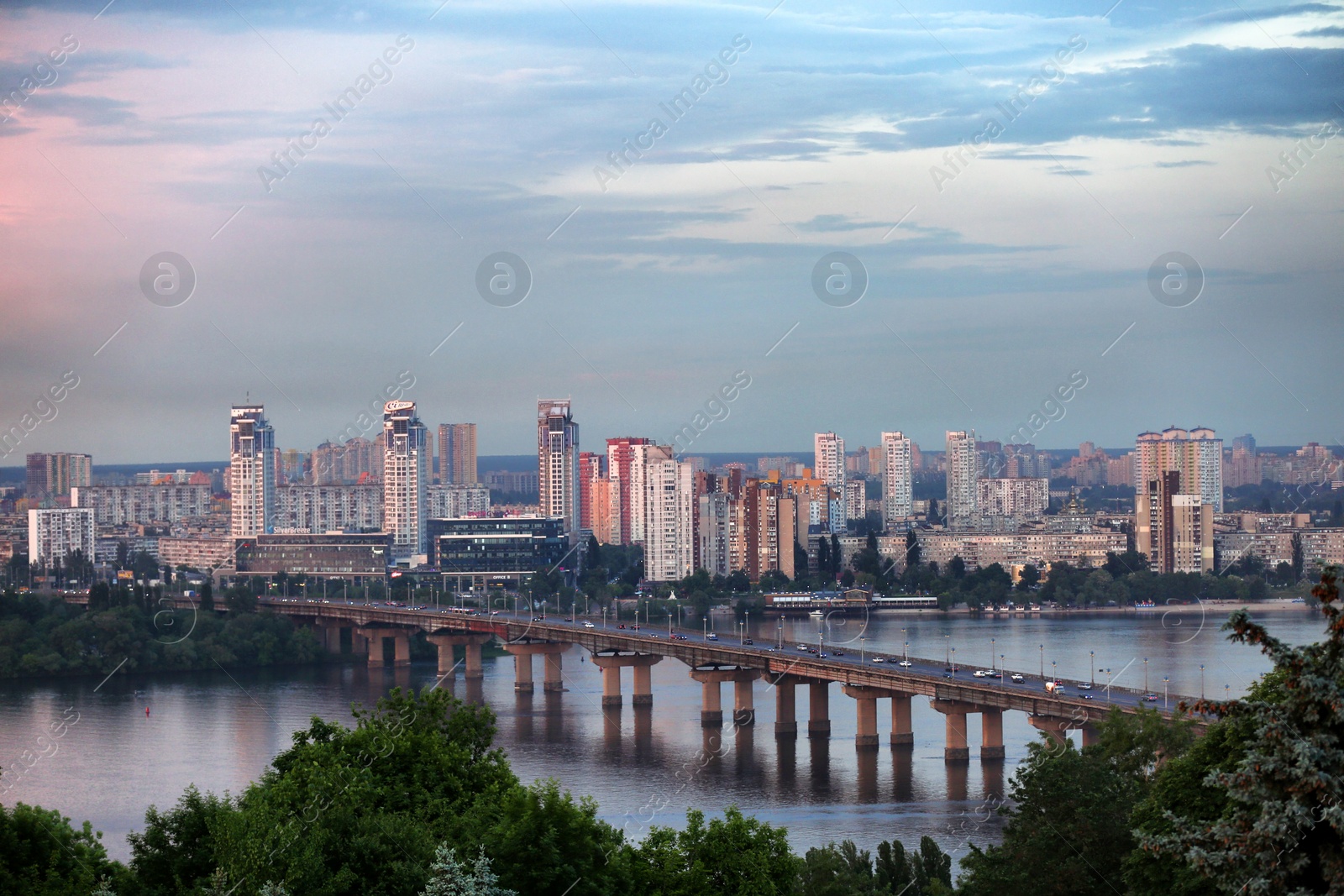 Photo of KYIV, UKRAINE - MAY 23, 2019: Beautiful view of Paton bridge over Dnipro river