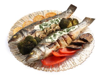 Plate with delicious sea bass fish and ingredients isolated on white