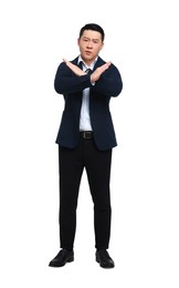 Photo of Angry businessman in suit posing on white background