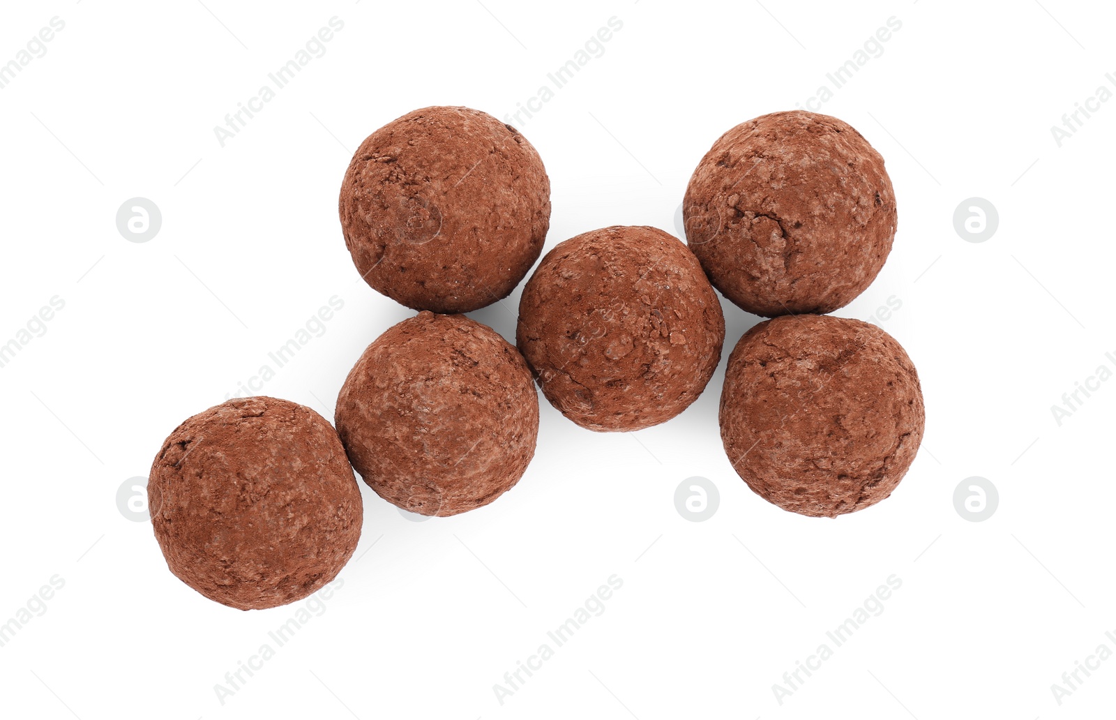 Photo of Tasty sweet chocolate candies isolated on white, top view