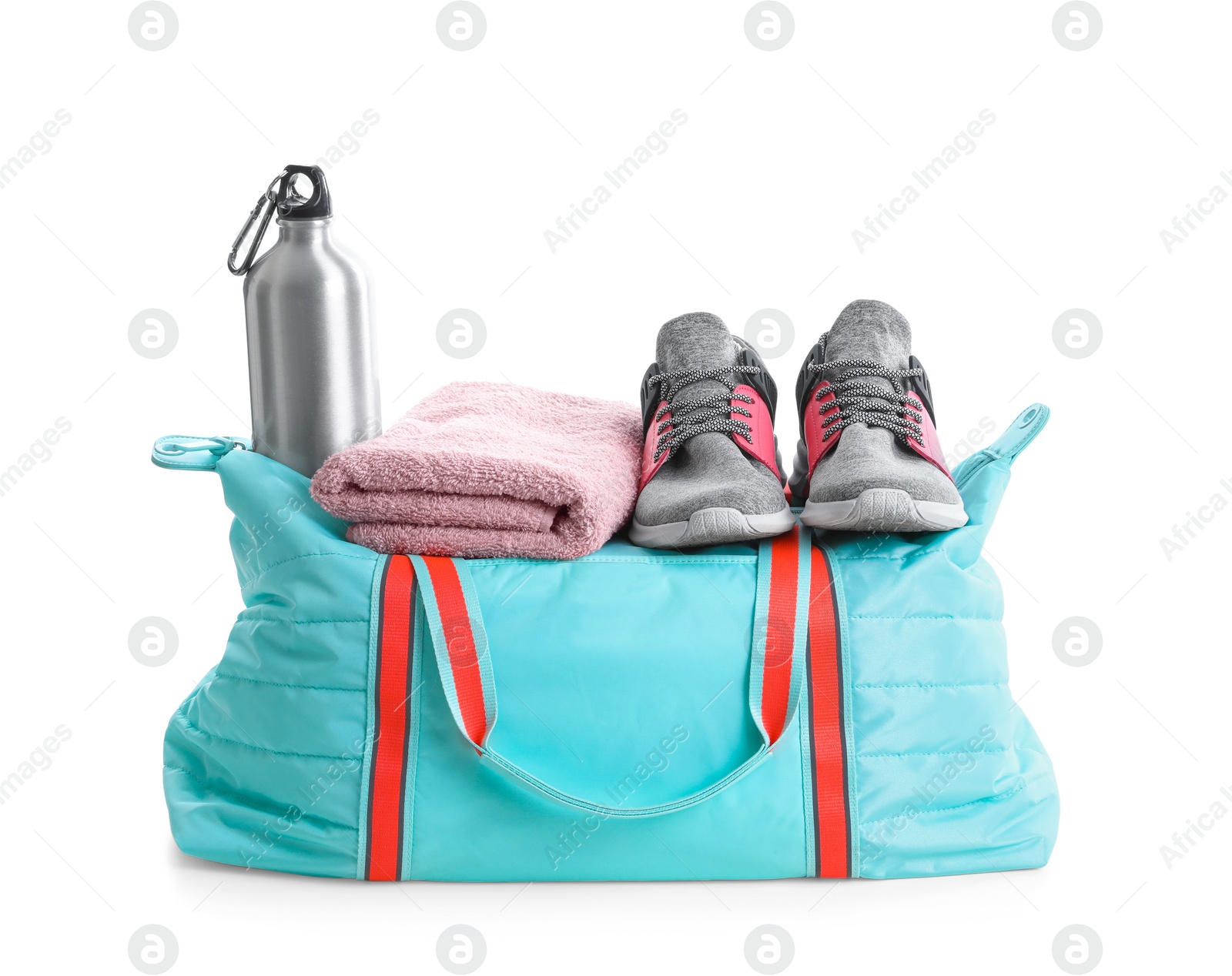 Photo of Sports bag with gym equipment on white background
