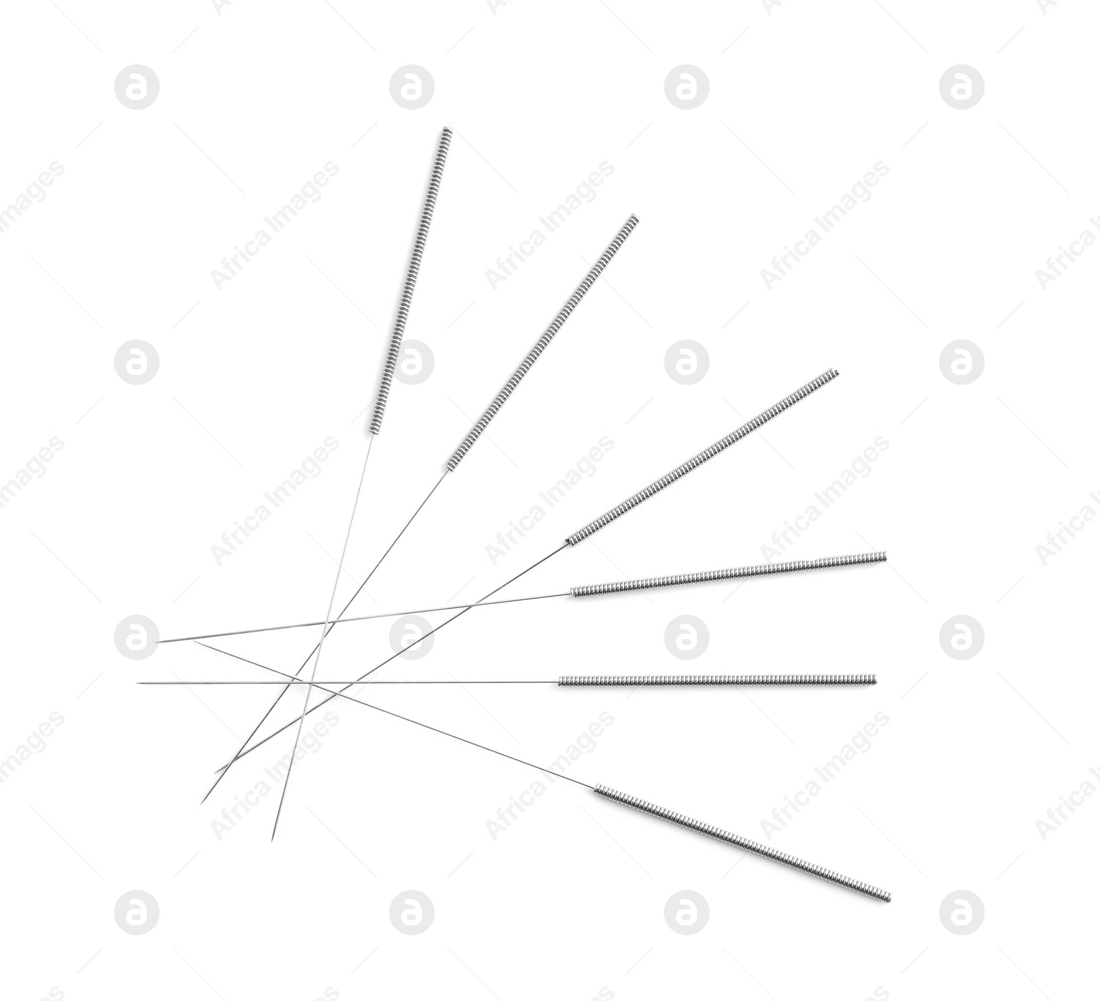 Photo of Needles for acupuncture on white background