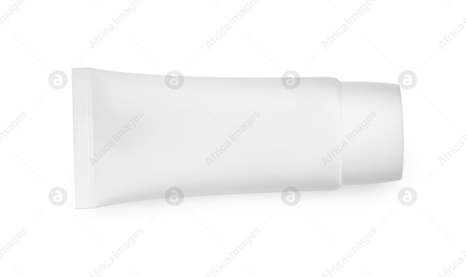 Photo of Tube of hand cream isolated on white, top view