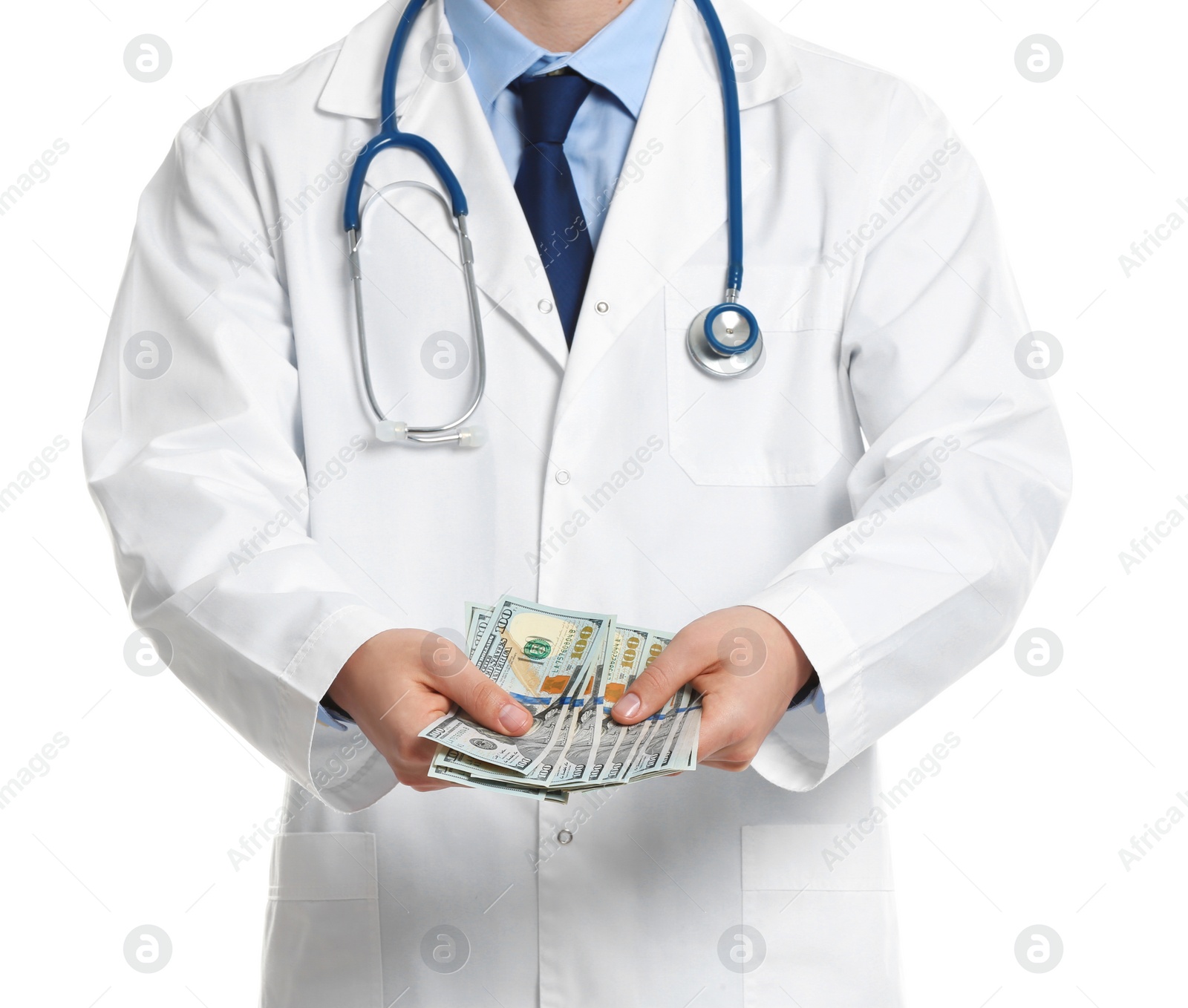 Photo of Doctor with bribe on white background, closeup. Corruption in medicine