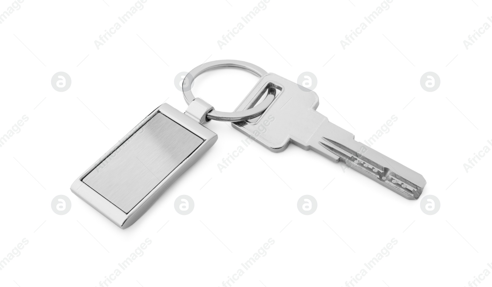 Photo of Key with metallic keychain isolated on white