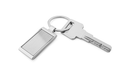 Photo of Key with metallic keychain isolated on white