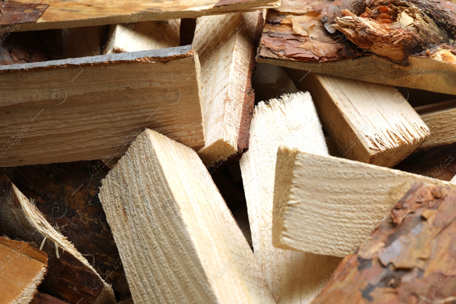 Photo of Cut firewood as background, closeup. Heating in winter