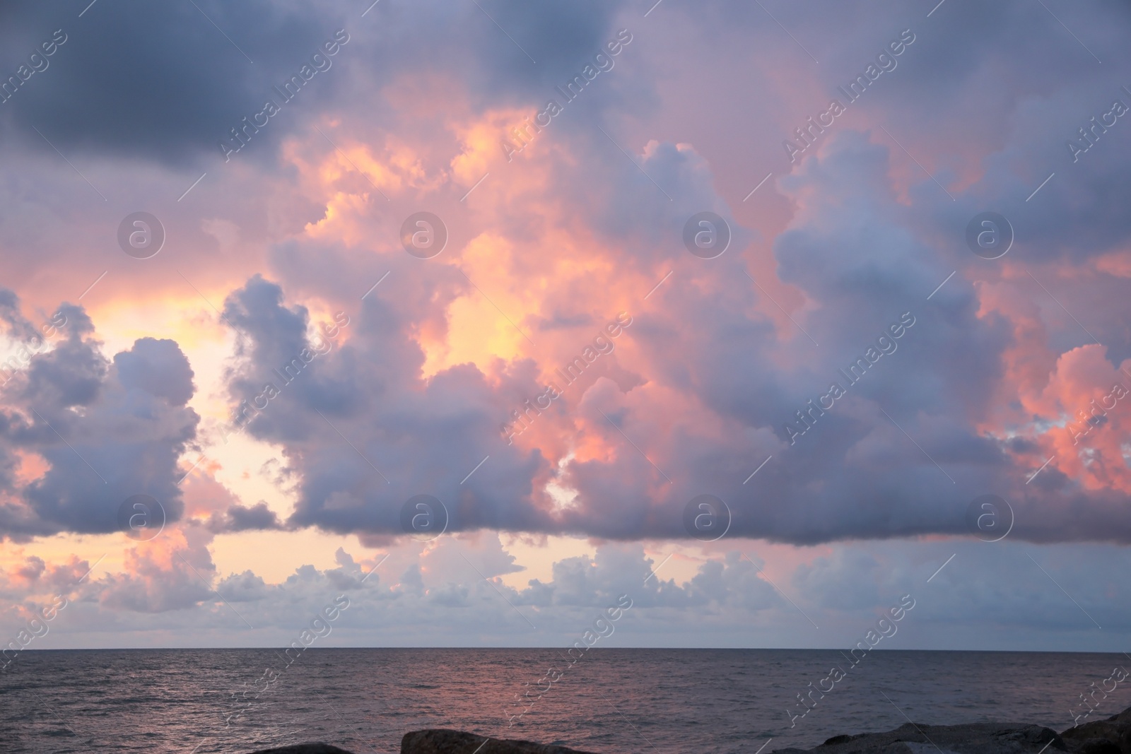 Photo of Picturesque view of sky with heavy rainy clouds over sea