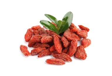 Photo of Pile of dried goji berries and leaves on white background