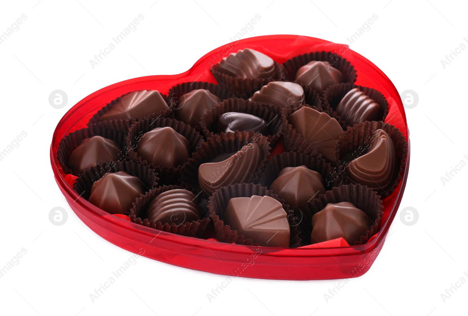 Photo of Heart shaped box with delicious chocolate candies on white background