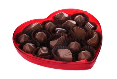 Photo of Heart shaped box with delicious chocolate candies on white background