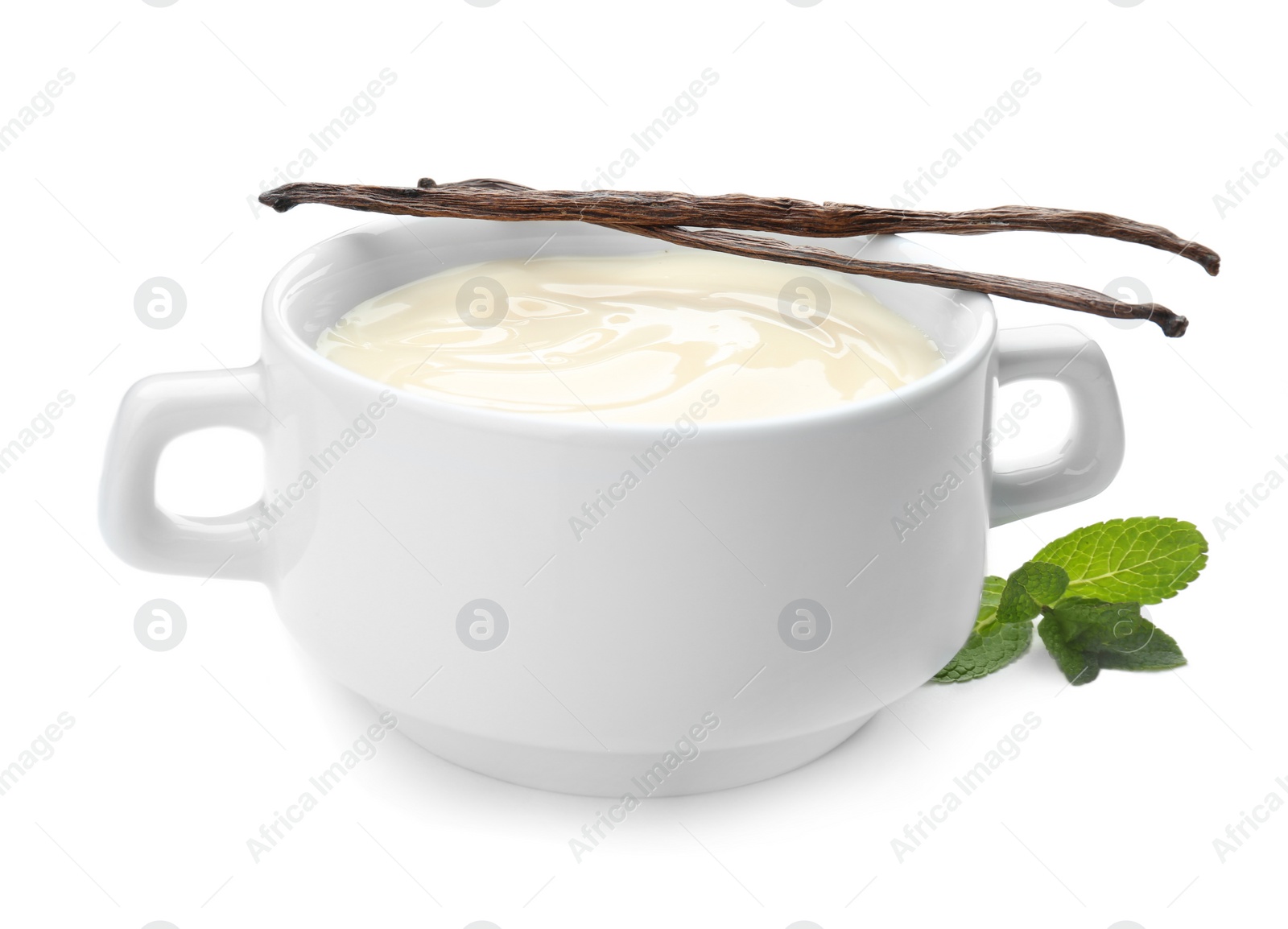 Photo of Vanilla pudding, sticks and fresh mint on white background