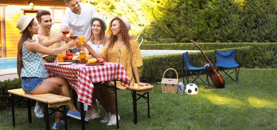 Image of Happy friends with drinks having fun at barbecue party outdoors. Banner design