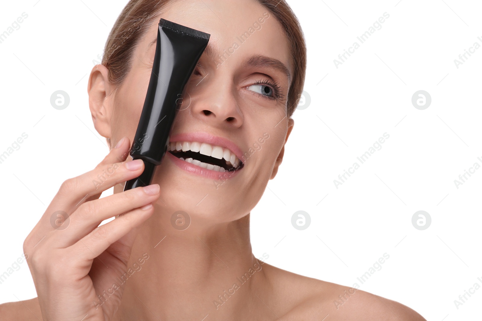 Photo of Woman holding tube with foundation on white background