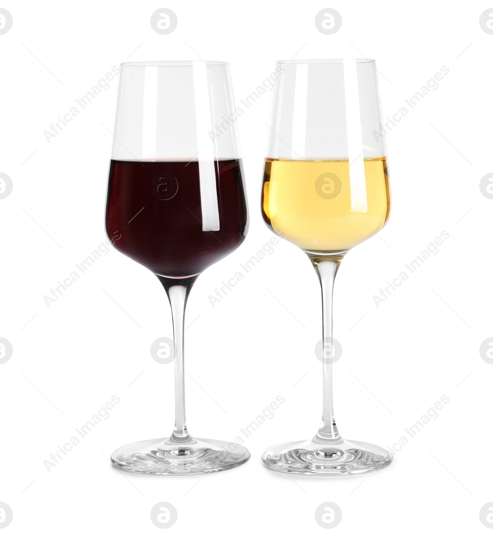 Photo of Glasses of different delicious expensive wines on white background