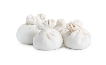 Photo of Uncooked khinkali (dumplings) isolated on white. Georgian cuisine