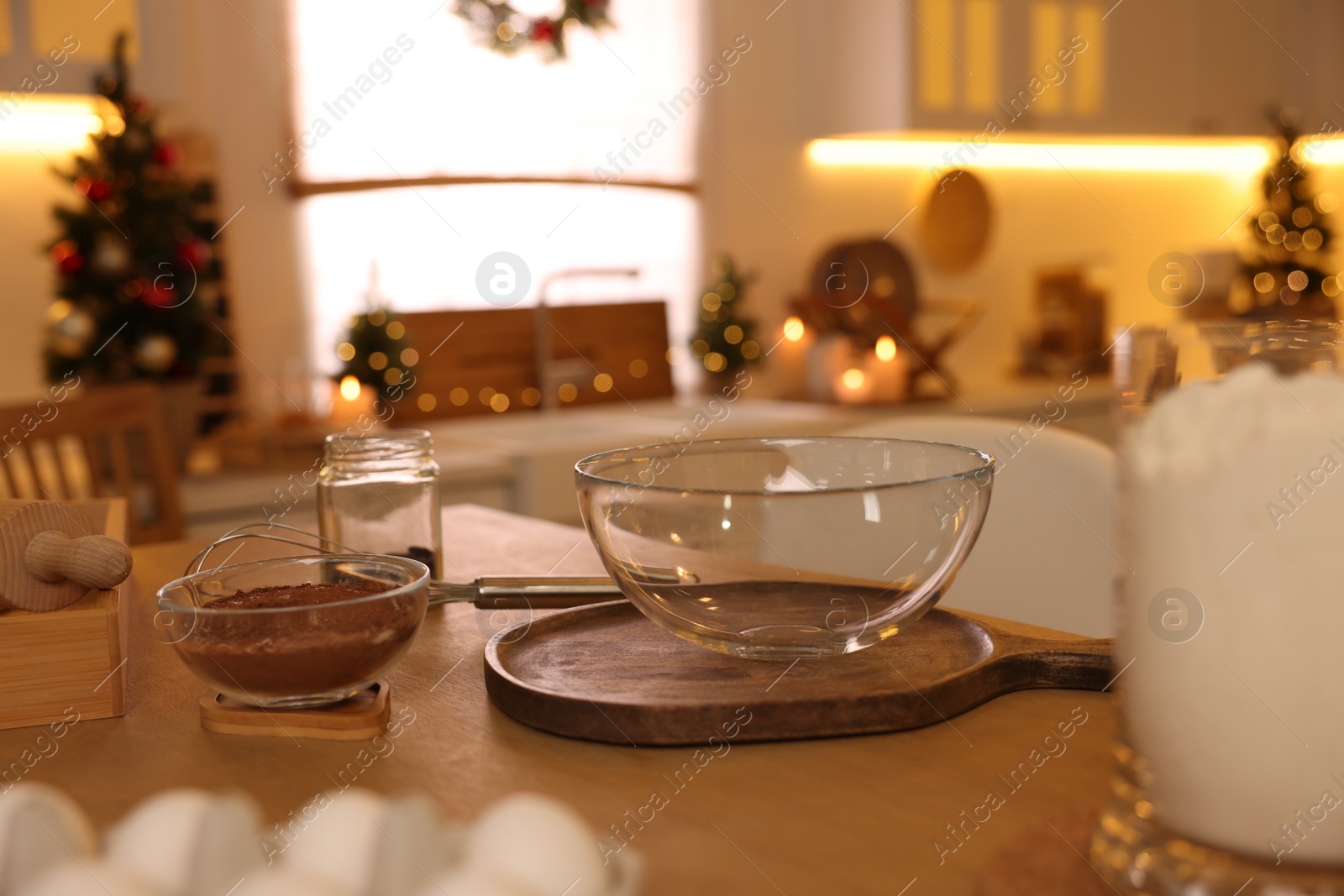 Photo of Ingredients on wooden table in kitchen. Making homemade Christmas cookies