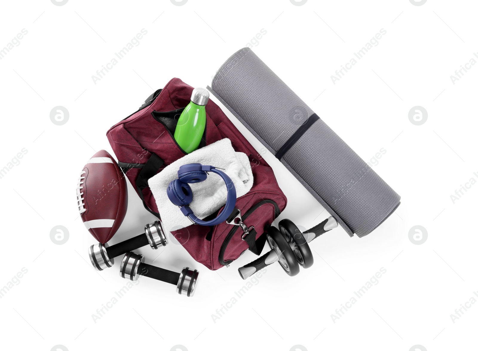 Photo of Gym bag and sports equipment on white background, top view