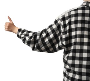 Woman showing hitchhiking gesture on white background, closeup