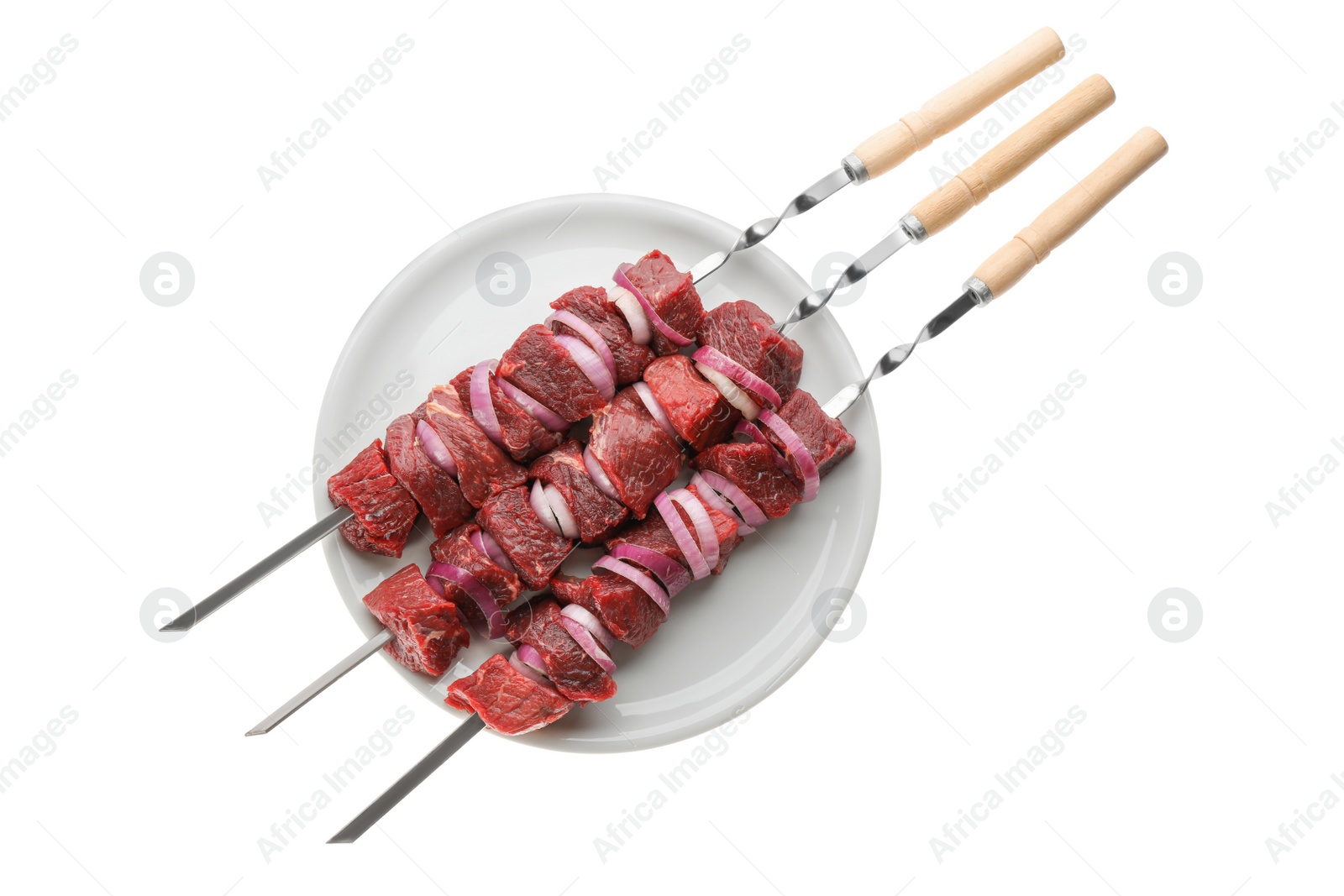 Photo of Metal skewers with raw meat and onion on white background, top view