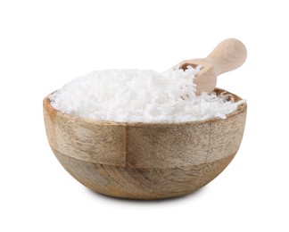 Coconut flakes in bowl and scoop isolated on white