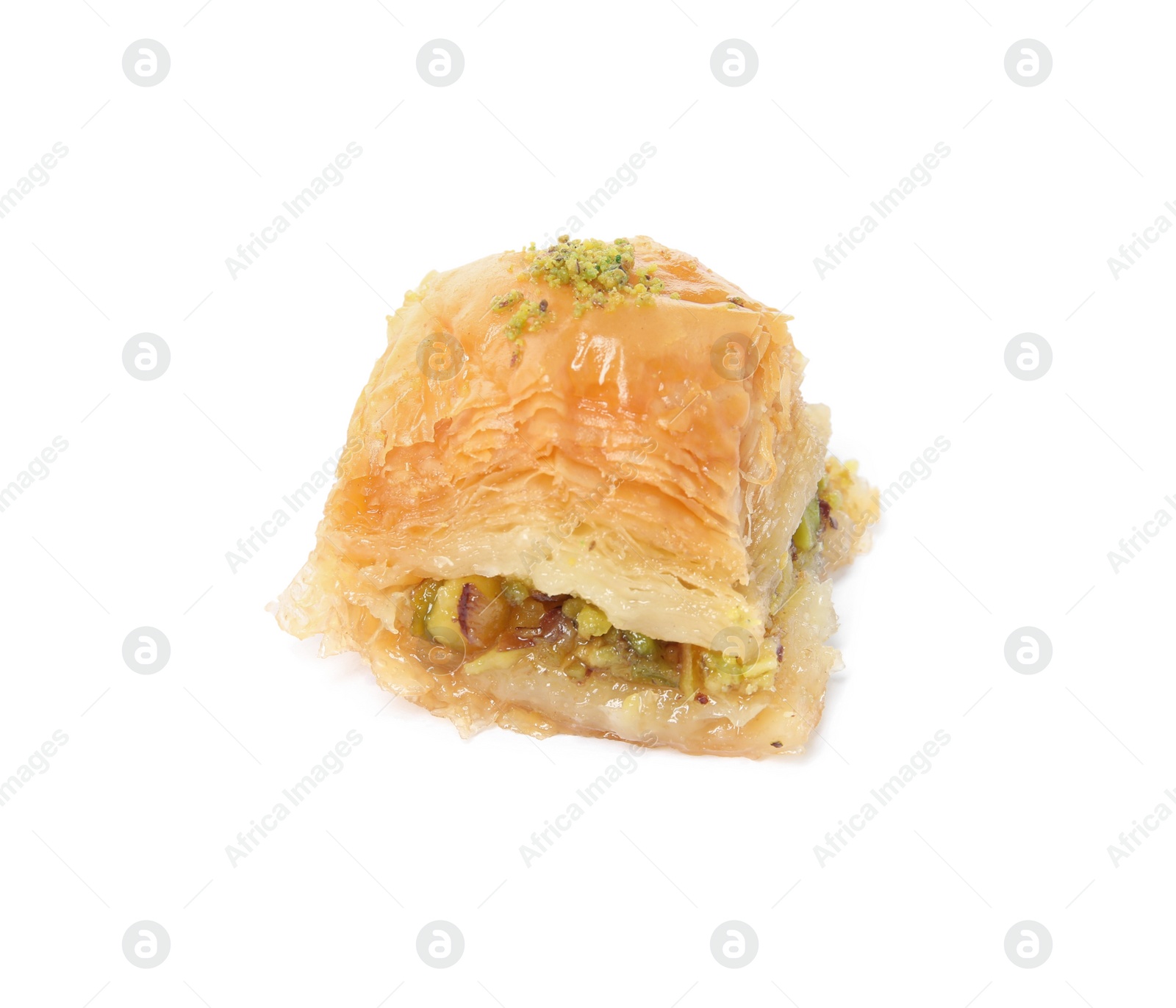 Photo of Piece of delicious baklava with pistachios isolated on white