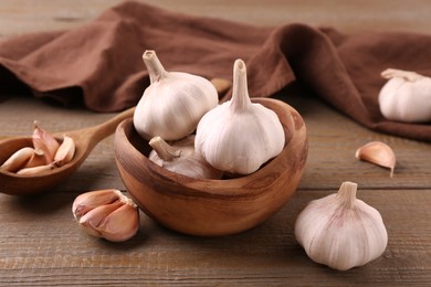 Fresh garlic on wooden table, closeup view