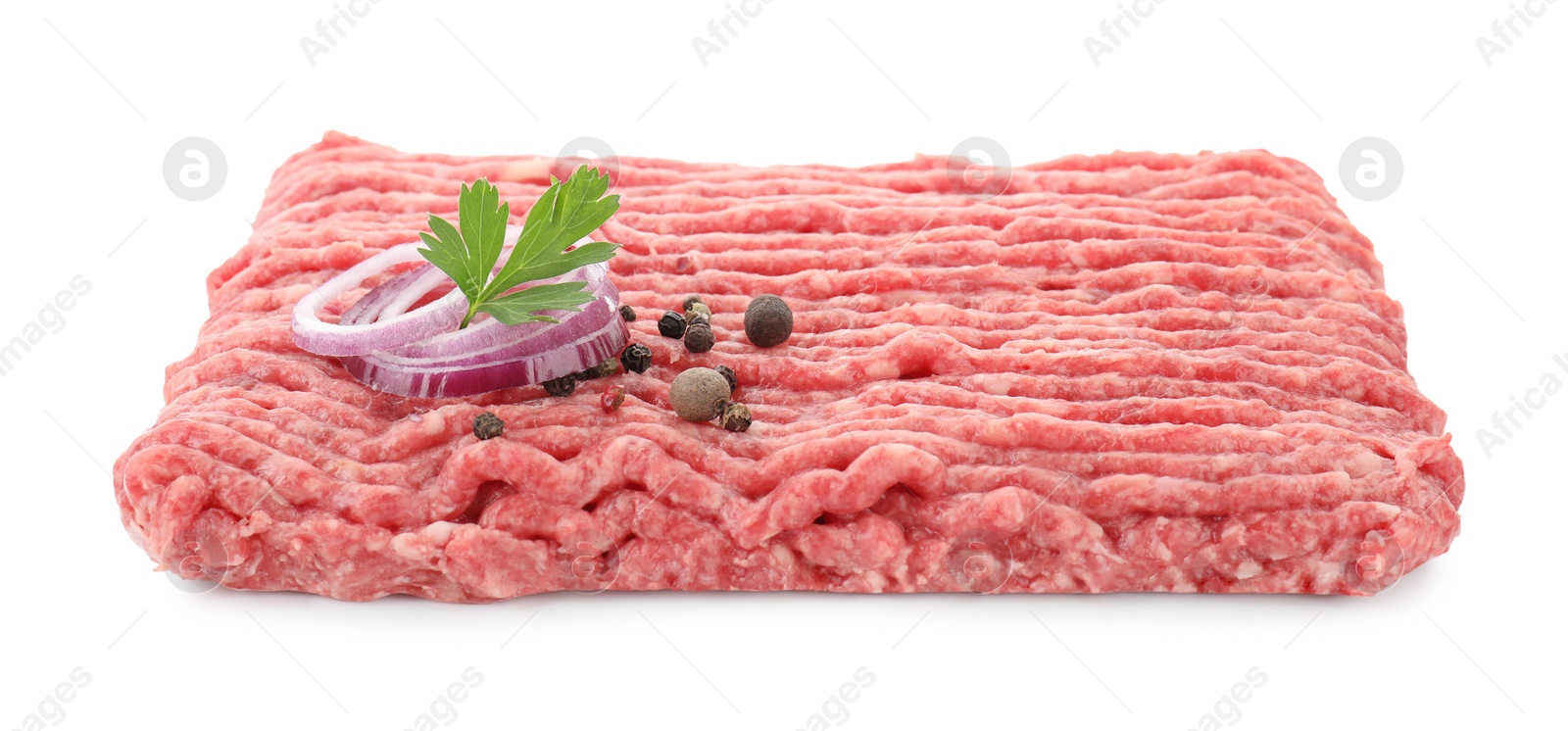 Photo of Raw ground meat, onion, peppercorns and parsley isolated on white