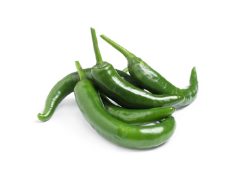 Green hot chili peppers on white background