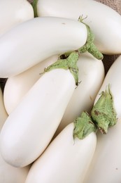 Fresh white eggplants on table, top view