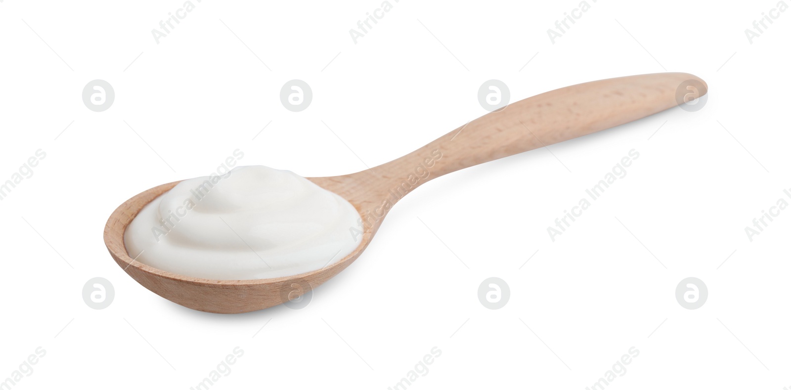 Photo of Delicious natural yogurt in spoon isolated on white