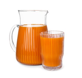 Photo of Fresh carrot juice in jug and glass isolated on white