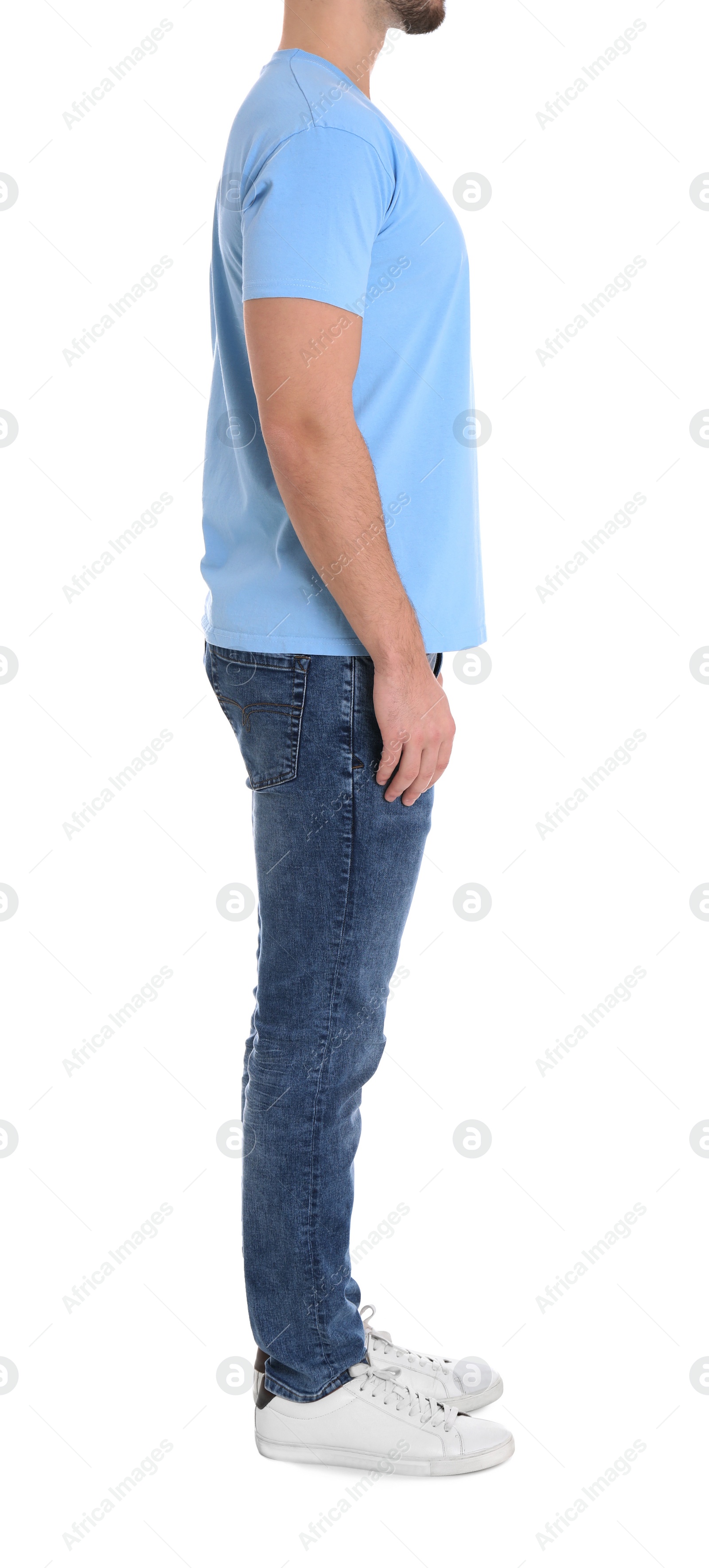 Photo of Young man on white background, closeup. Weight loss