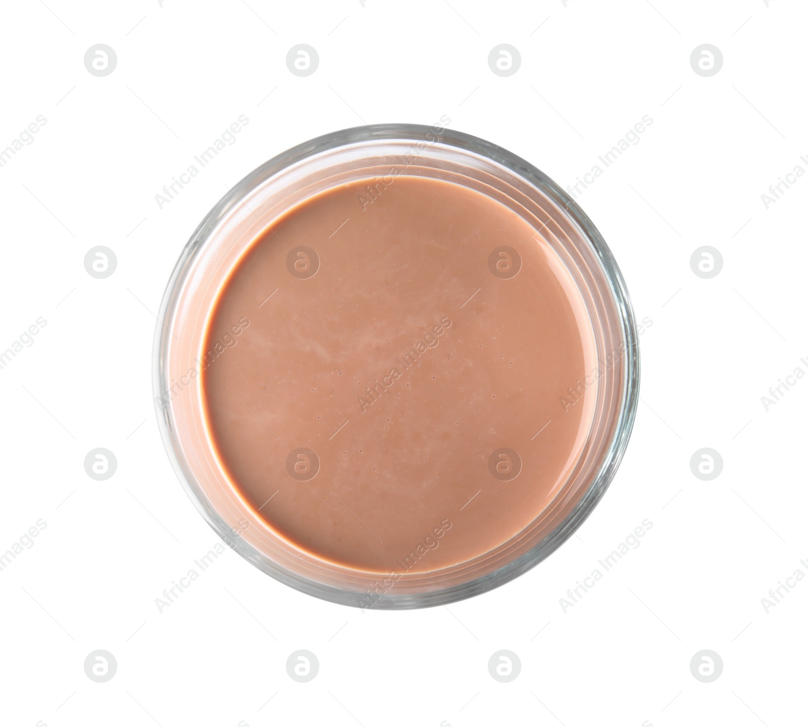 Photo of Glass with tasty chocolate milk on white background, top view. Dairy drink