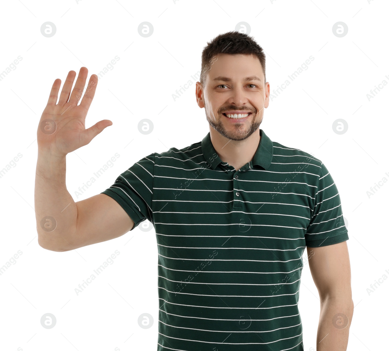 Photo of Cheerful man waving to say hello on white background