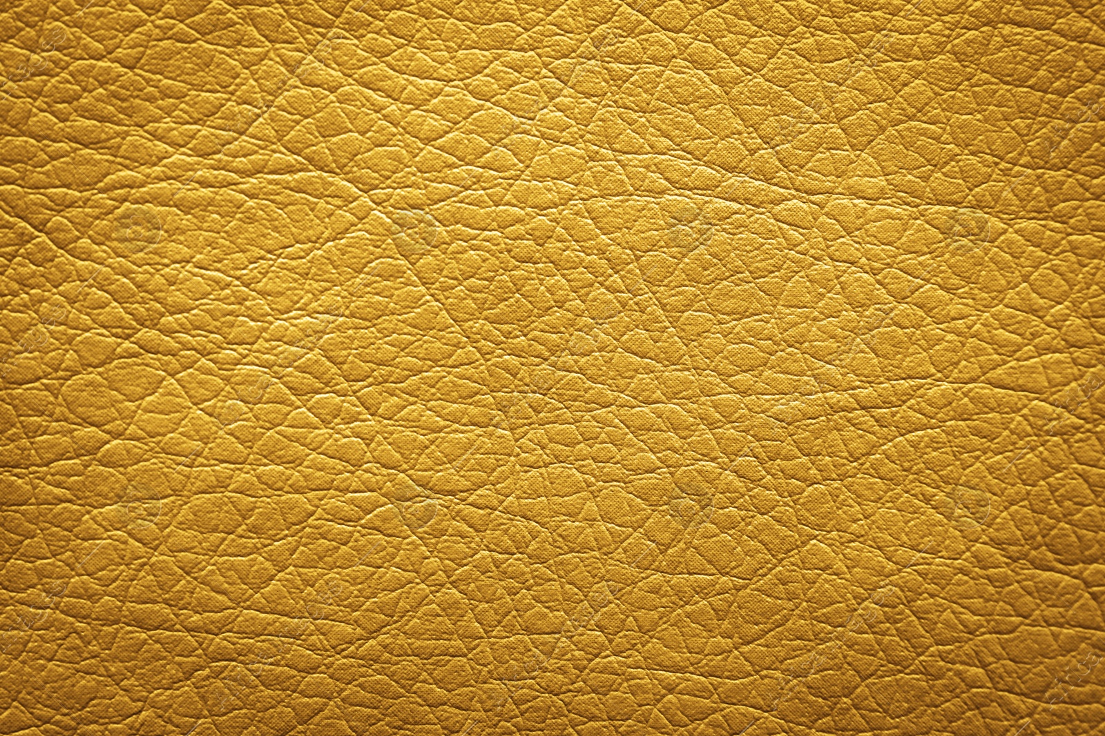 Image of Golden textured surface as background, closeup view